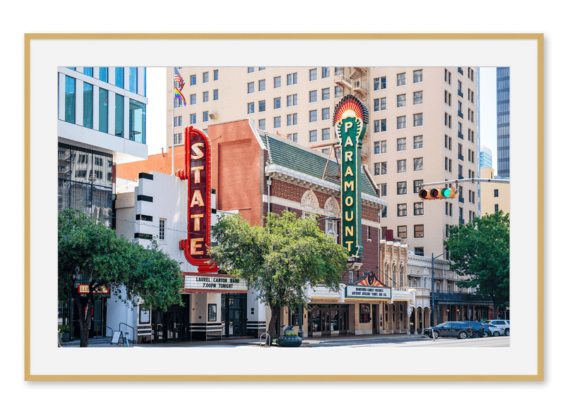 Bright signs hang at the entrance of Paramount Theatre in Austin, TX