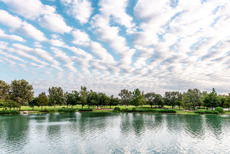 Clouds fill the sky above the lake at Mueller Lake Park