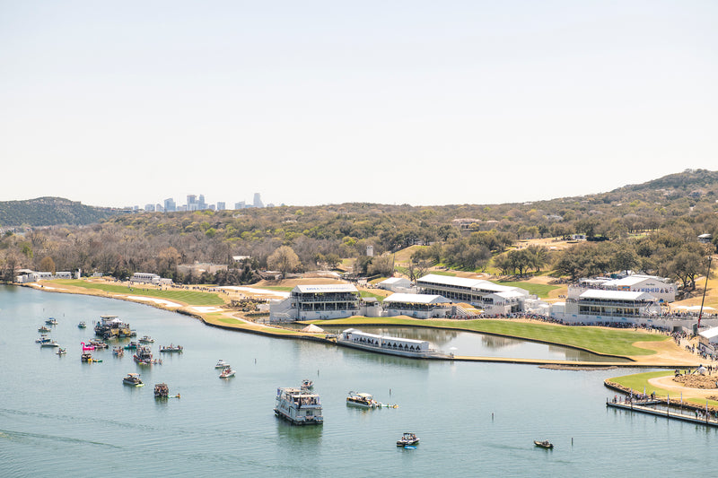 Boats gather on Lake Austin near the WGC-Dell Match Play professional golf tournament at Austin Country Club